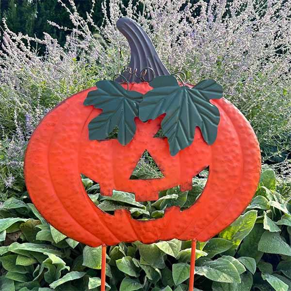 Deep orange pumpkin garden stake 34 inches tall.
