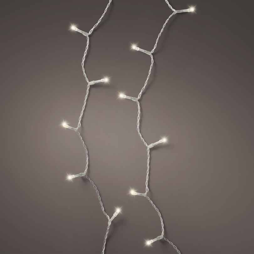 The Durawise Battery Operated LED Twinkle String Lights – Warm White by Available for Pick-Up & Delivery feature evenly spaced warm white LEDs on a thin, twisted white wire—ideal for creating a gentle glow against any dark background.