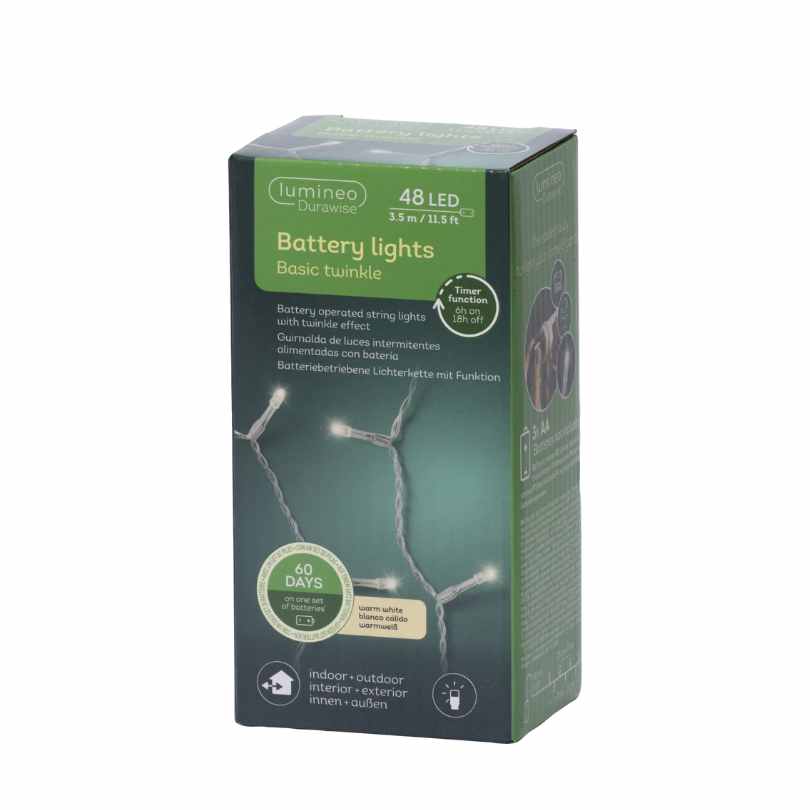 A green box of Durawise Battery Operated LED Twinkle String Lights – Warm White features 48 LEDs for indoor/outdoor use. The packaging shows the product name, features, an outdoor string lights image, and the Available for Pick-Up & Delivery brand.