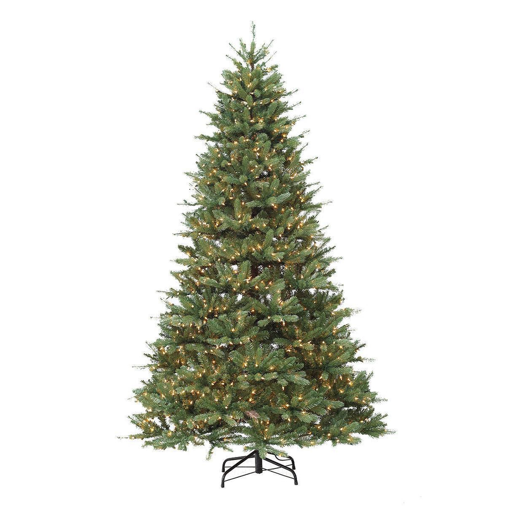 The Landcaster Fir Multi-Function 7.5 Ft. tree, available for pick-up & delivery, boasts dense green branches with warm white lights on a sturdy black metal base against a plain white background.