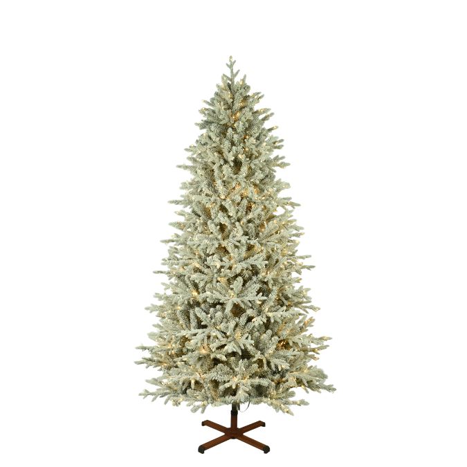 A 7.5-foot Nordic Flocked Fir Multi-Function Lights artificial Christmas tree with flocked branches and pre-lit warm white lights, standing on a brown metal cross base.