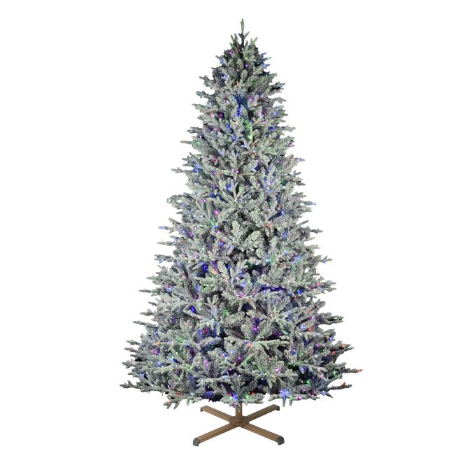 A 9 Ft. Nordic Flocked Fir Multi-Function Lights artificial Christmas tree with flocked branches and multi-colored lights standing on a metal base.