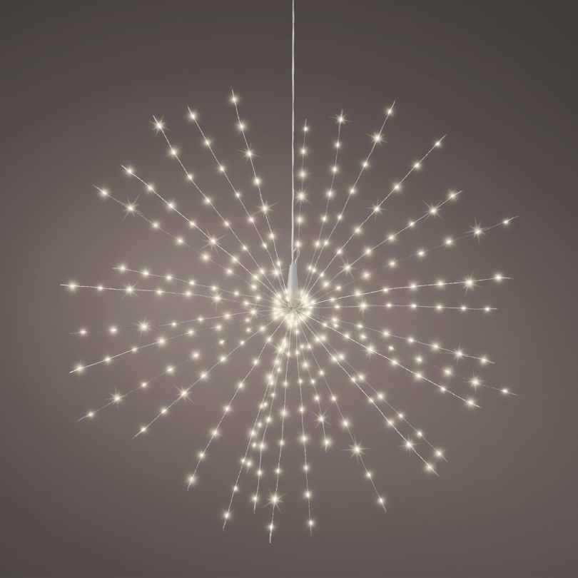 The Polestar Micro LED Light – Warm White – 30-Inch features a starburst design with radiant spokes tipped by glowing bulbs, creating a firework-like effect—ideal for modern holiday décor against neutral backgrounds. Available for Pick-Up & Delivery.