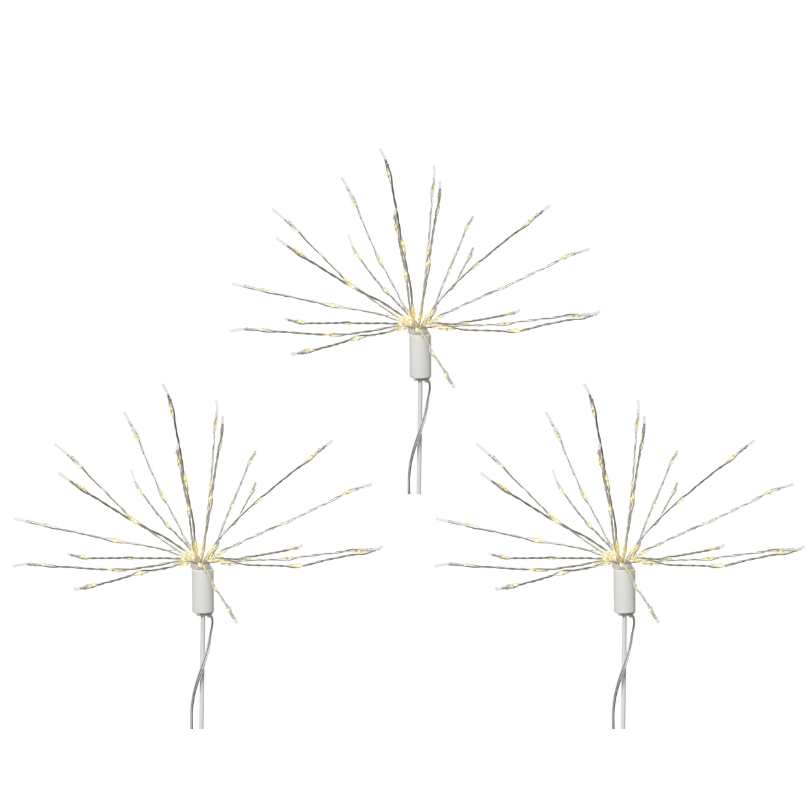 The Polestar Micro LED Stake Lights – Warm White – Set of 3 from Available for Pick-Up & Delivery features thin, radiating wires resembling fireworks, perfect for outdoor décor. Each has a white base and visible cord, and they can be arranged in a triangular pattern.