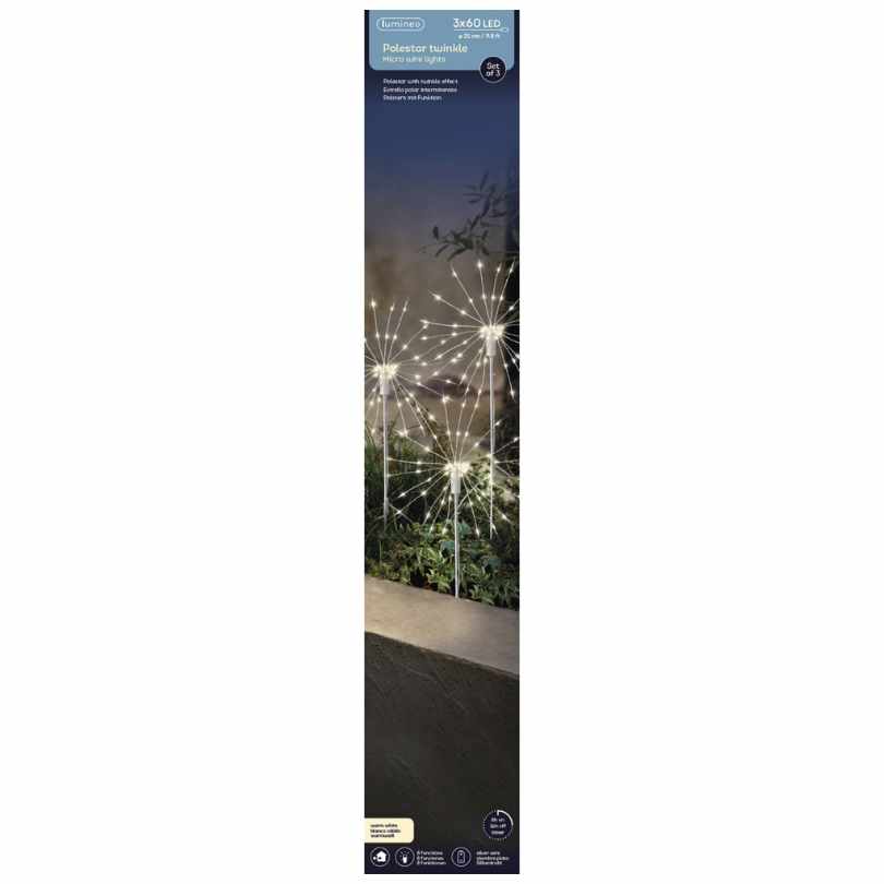 A box of Polestar Micro LED Stake Lights – Warm White – Set of 3 (Available for Pick-Up & Delivery) features glowing dandelion-shaped spheres lighting up an outdoor garden, with energy-saving and weatherproof features highlighted on the packaging.