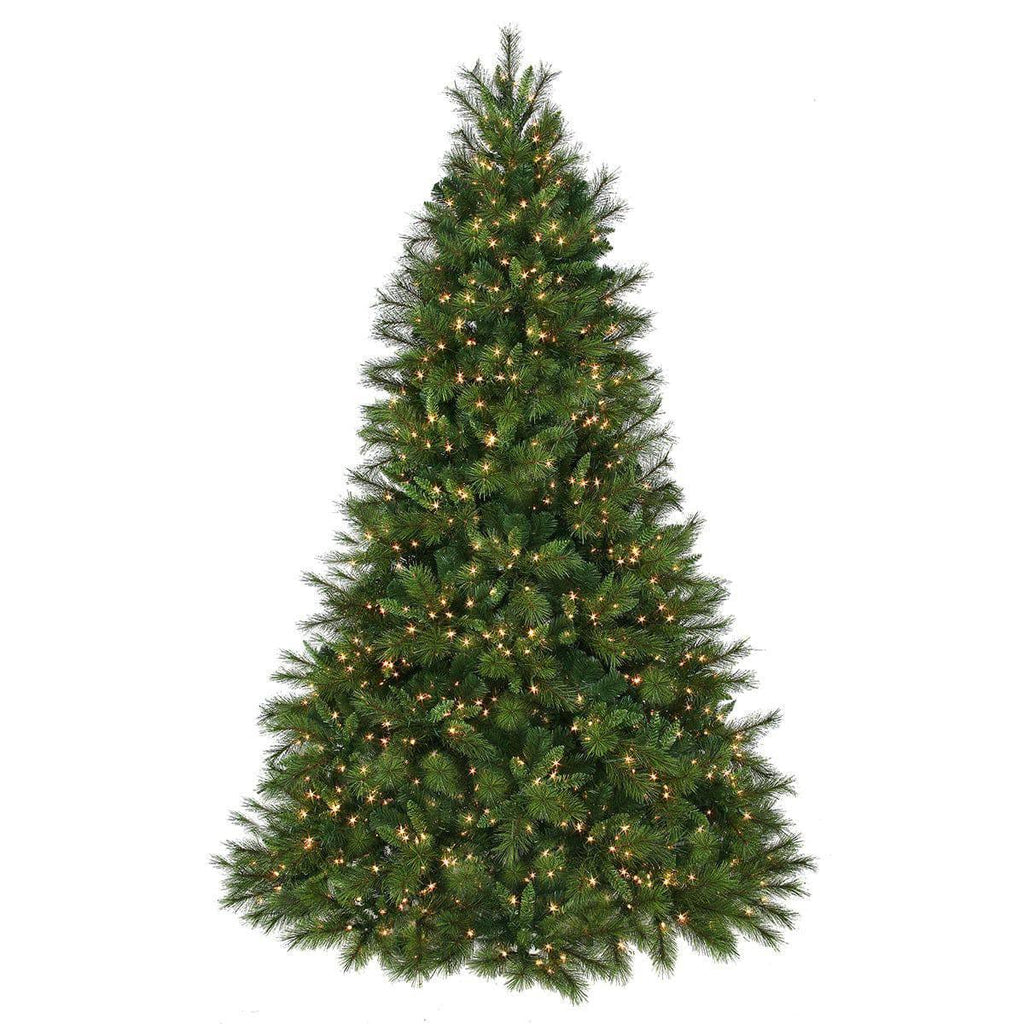 The Wyoming Fir artificial Christmas tree, available for pick-up and delivery, features lifelike green needles and warm white LED lights. At 9 ft tall, this lush, full, and symmetrical tree exudes a festive cheer against a plain white backdrop.