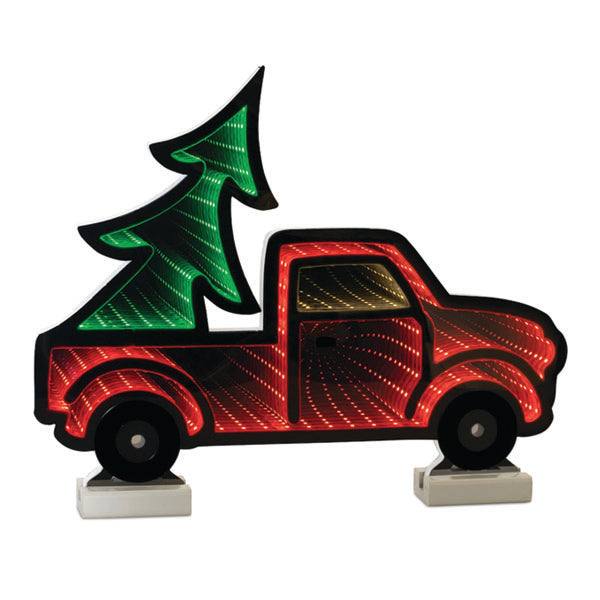 Infinity light Christmas decoration of a red pick up ruck with a large Christmas tree in the back.