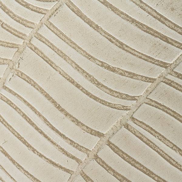 Close-up of an off-white surface with wavy, parallel lines and diagonal grooves, reflecting the decorative patterns featured on the All Delivery Options Zara Planter - Off White – 12.20-inches.