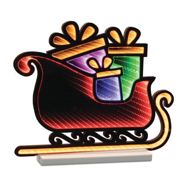 The 15 Infinity Light – Sleigh with Packages from Available for Pick-Up & Delivery features red and black colors with infinity light effects, curved runners, and vibrant gifts adorned with yellow bows, creating a festive glow ideal for holiday decor.