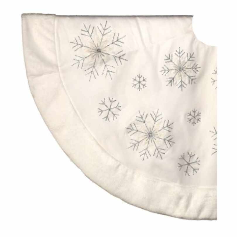 The Tree Skirt - White Velvet Snowflake - 48" features silver embroidered snowflakes in various sizes and a plush border—perfect for a festive Christmas tree. Available for pick-up & delivery.